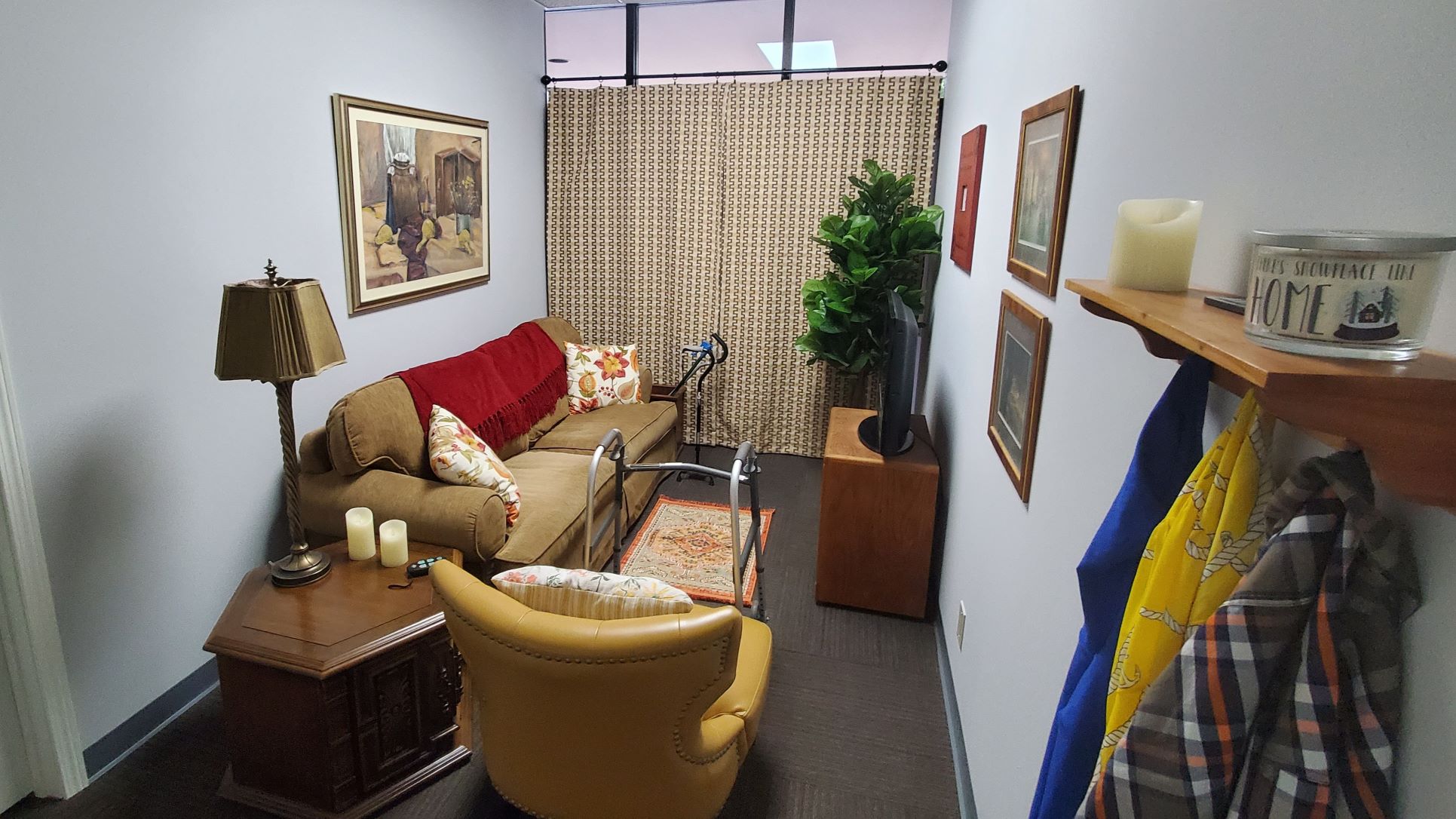 The living room provides caregivers challenges they may face and the opportunity to practice care techniques in a senior's home.