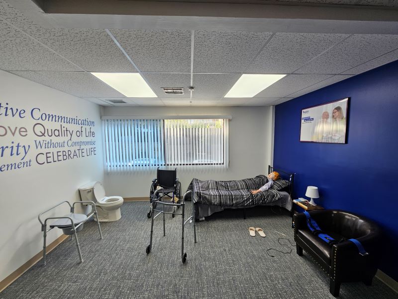 The Center of Excellence is a training space designed as a realistic simulation of a client’s home to help train caregiver about the safety of a client’s home, and demonstrate the proper use of durable medical equipment.