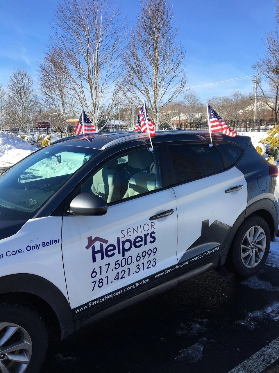 One of our cars with flags to honor the veterans