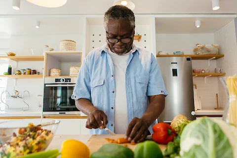 https://www.seniorhelpers.com/site/assets/files/411624/chopping_vegetables_for_a_healthy_meal.480x0.webp