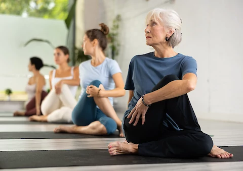 Stretching vs. Yoga for Seniors: 3 Key Differences