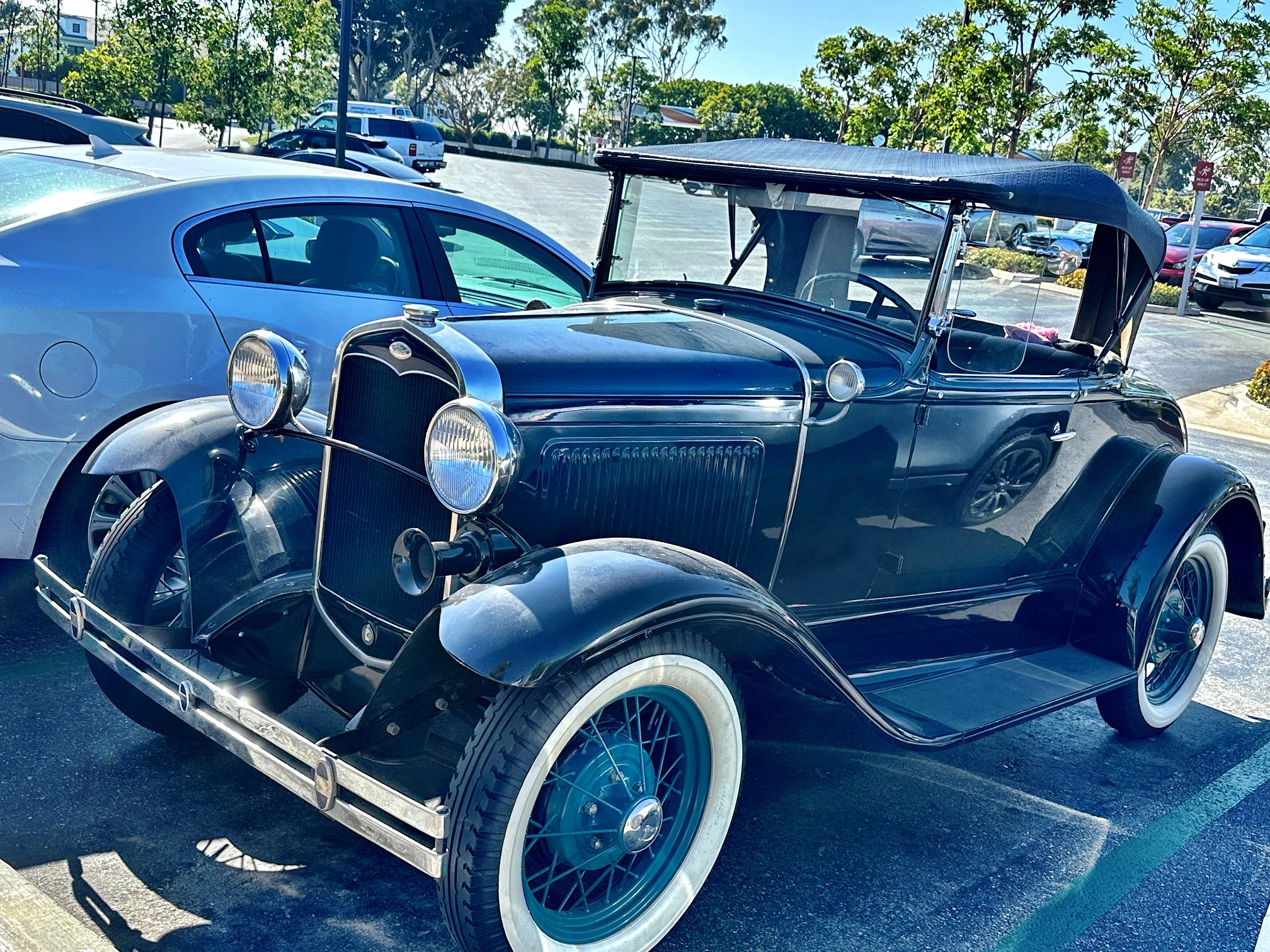 Always a good day when one of our senior clients can show off their classic car in Newport Beach.