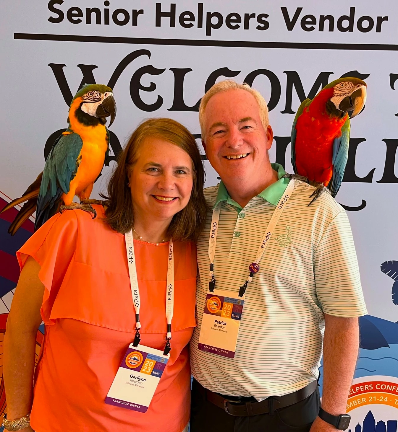 Pat and Geri Reardon pose with a couple macaws at our recent Senior Helpers National Conference in Tampa, FL.