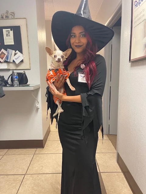 Sabrina and Taco take a moment to show off their Halloween costumes