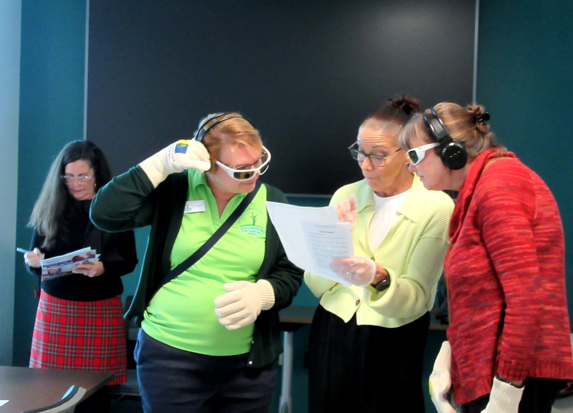 Event participants gather to listen to instructions as they begin their Virtual Dementia Tour® at the AdventHealth Innovation Tower in Orlando, Florida on January 8, 2024.