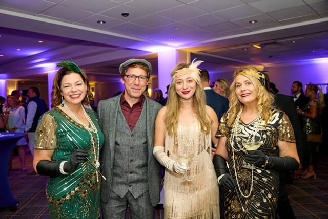 Our team at the 2025 Senior Helpers Conference Gatsby-themed dinner!