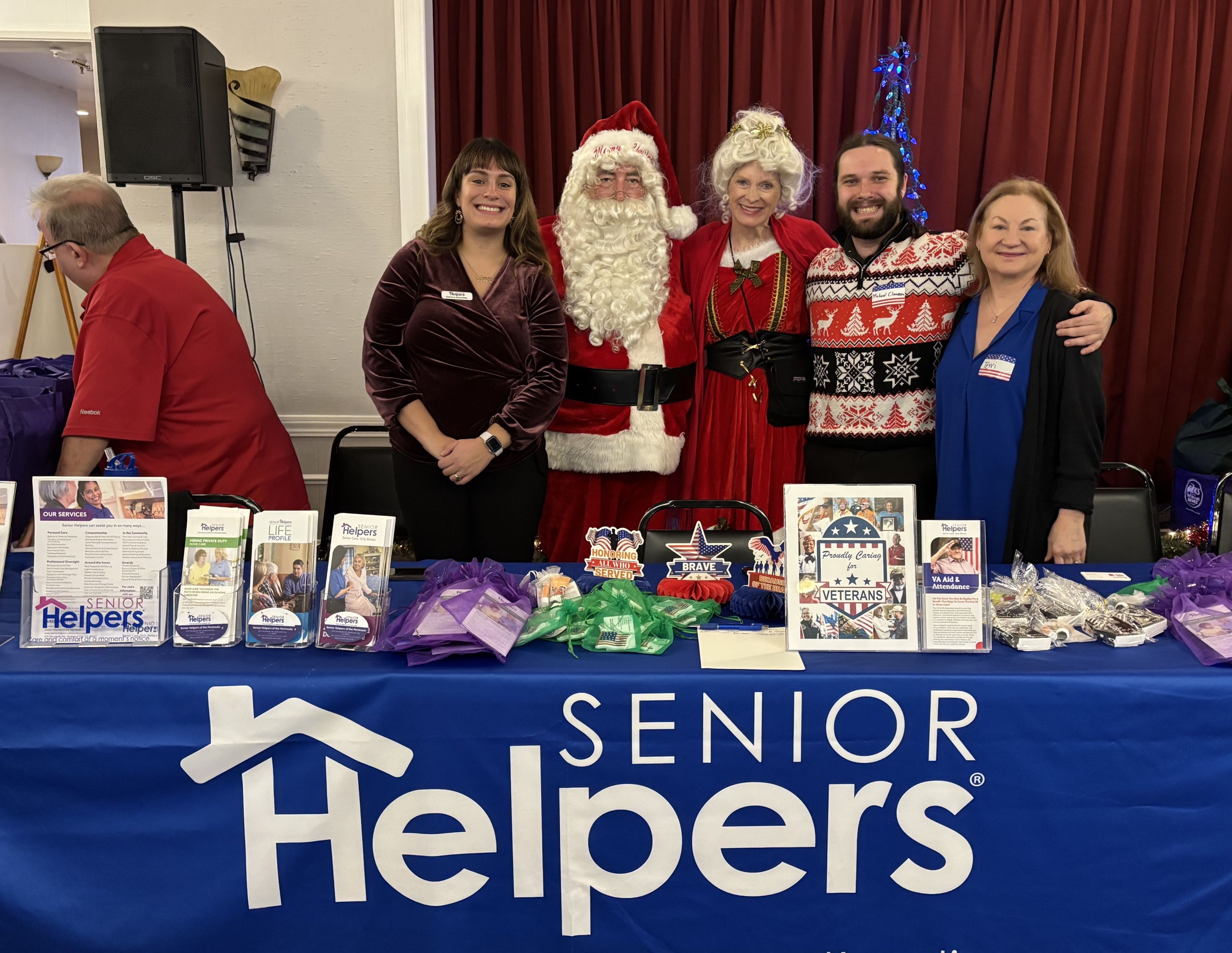 Our office recently participated in Veterans Christmas hosted at the San Mateo Elks lodge! It was a great opportunity for us to come together to celebrate the holiday season. We were able to provide information to veterans and their families about our in home care services. The Senior Helpers team (community relations manager Becky, client services manager Michael, and our caregiver Terri) had a great time and even got to meet Mr. and Mrs. Claus!